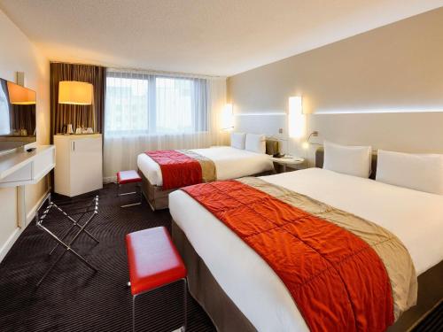 Habitación Doble Estándar con 2 camas dobles del hotel Mercure Lyon Centre Saxe Lafayette