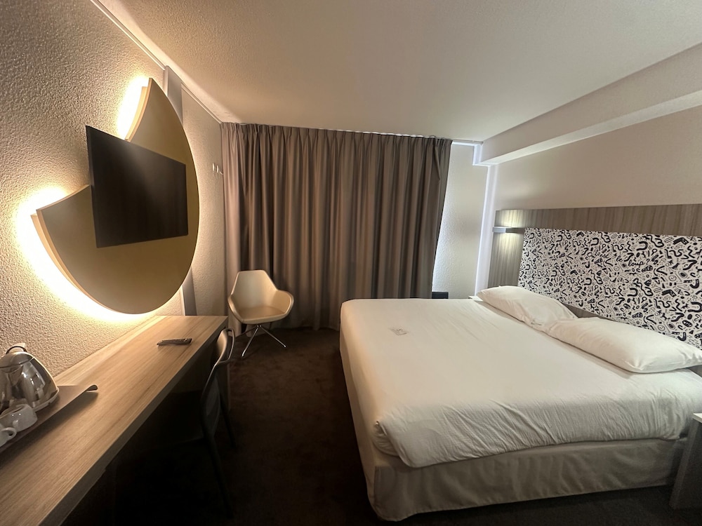Habitación Confort - 1 cama doble del hotel Ibis Styles Lyon Gorge de Loup Saphir. Foto 2
