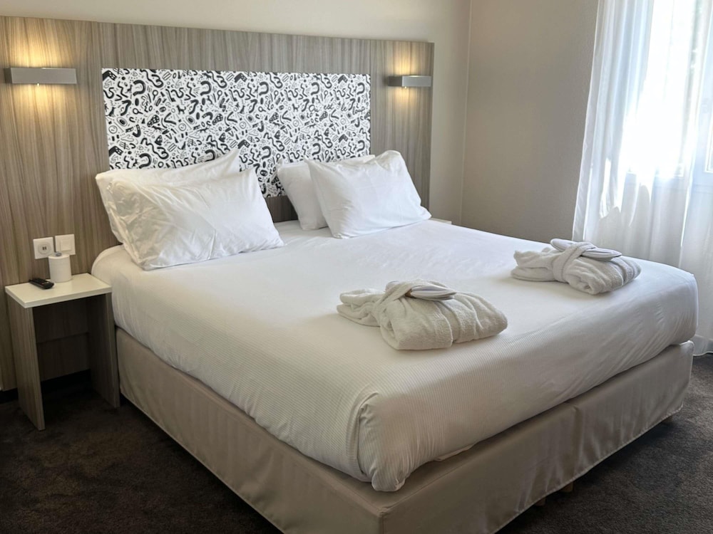 Habitación Confort - 1 cama doble del hotel Ibis Styles Lyon Gorge de Loup Saphir. Foto 5
