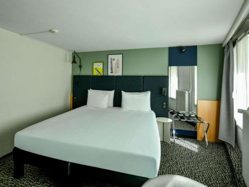 Habitación Doble Confort del hotel ibis Paris Grands Boulevards Opéra 9e. Foto 1