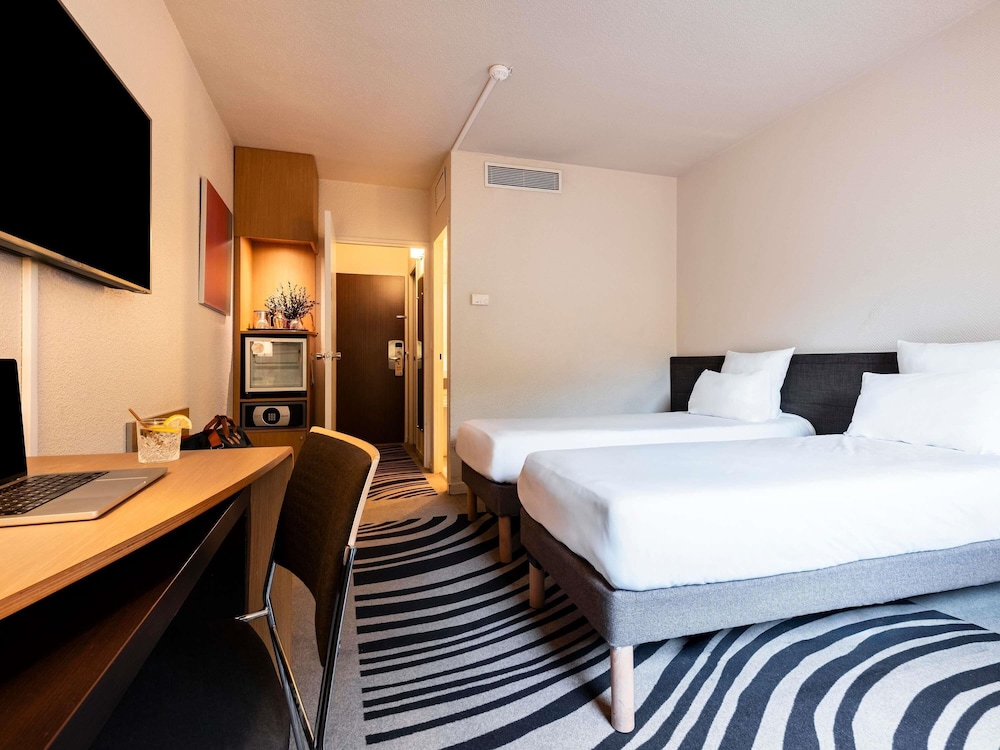 Habitación estándar con 2 camas individuales del hotel Novotel Atria Nimes Centre. Foto 4