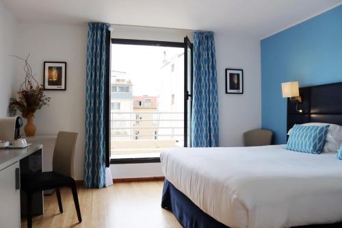 Habitación Doble Executive con terraza del hotel Nice Riviera. Foto 5