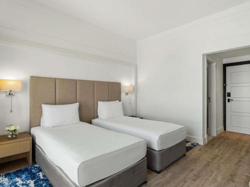 Deluxe Twin Room with Pool or Sea View del hotel Rixos Bab Al Bahr - All Inclusive. Foto 2