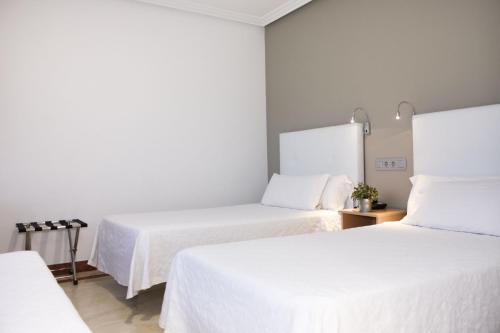 Habitación Triple del hotel Hospedium Castilla. Foto 2