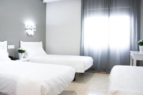 Habitación Triple del hotel Hospedium Castilla. Foto 5