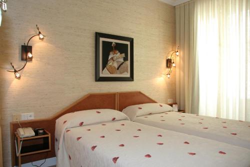 Habitación Doble - 2 camas del hotel Paris. Foto 10