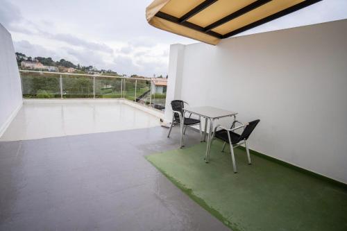 Habitación Doble con Terraza del hotel Lluna. Foto 1