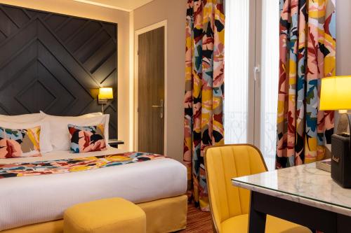 Habitación Doble Estándar del hotel Des Arts Paris Montmartre. Foto 6