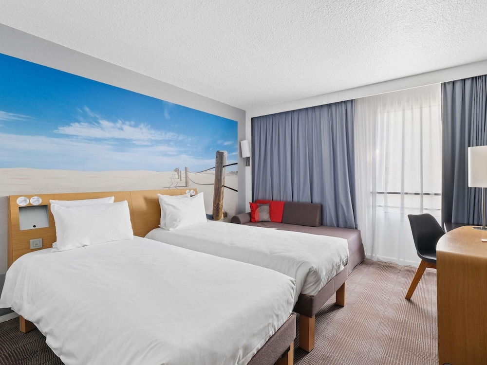 Habitación superior, 2 camas individuales del hotel Novotel Paris Est. Foto 1