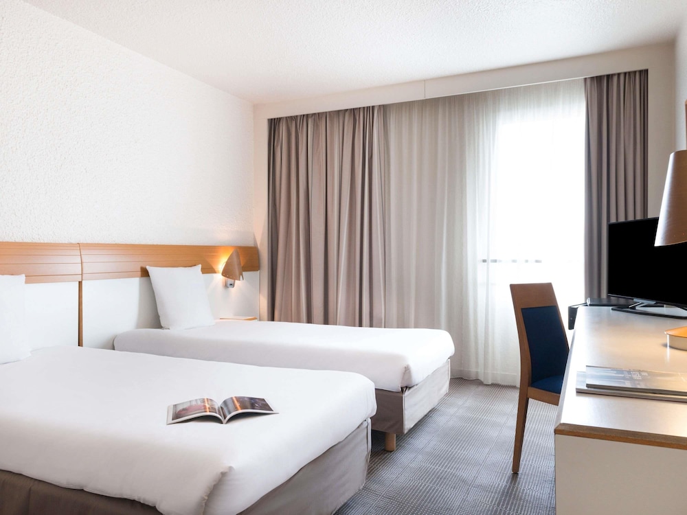 Habitación superior, 2 camas individuales del hotel Novotel Paris Est. Foto 2