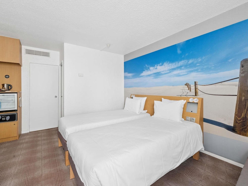 Habitación superior, 2 camas individuales del hotel Novotel Paris Est. Foto 3