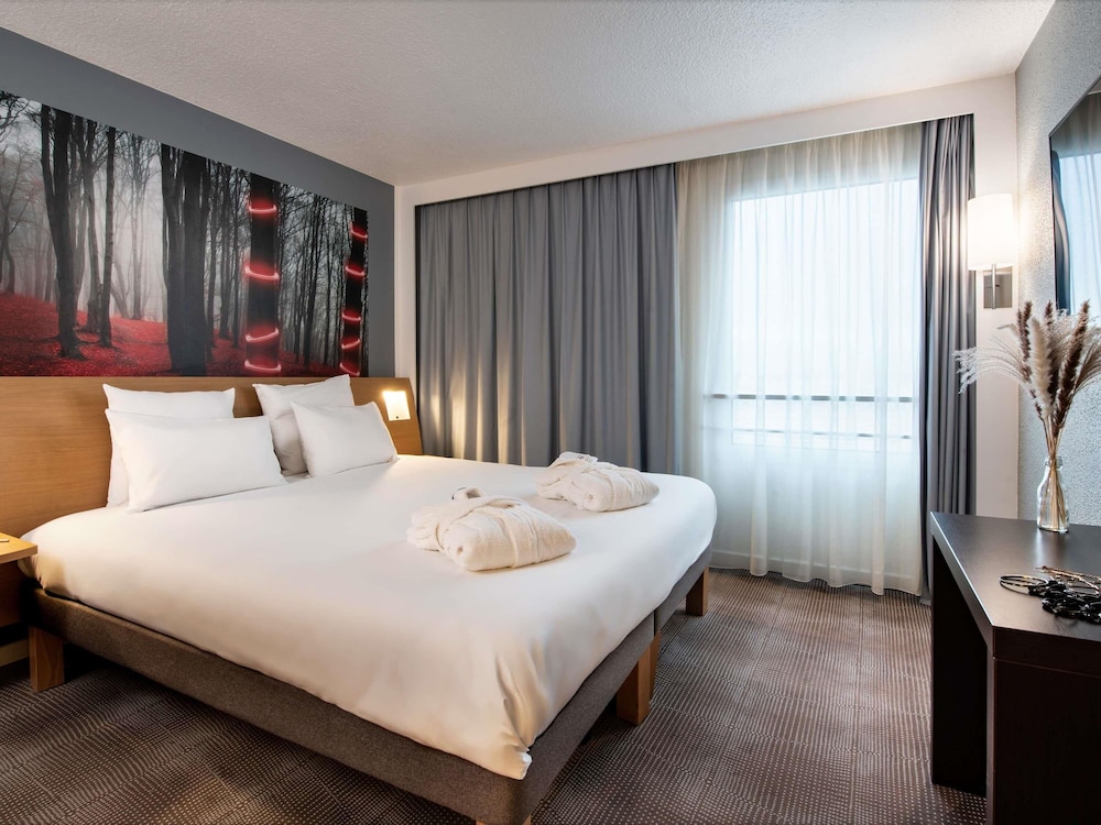 Suite, 1 cama doble con sofá cama del hotel Novotel Paris Est. Foto 4