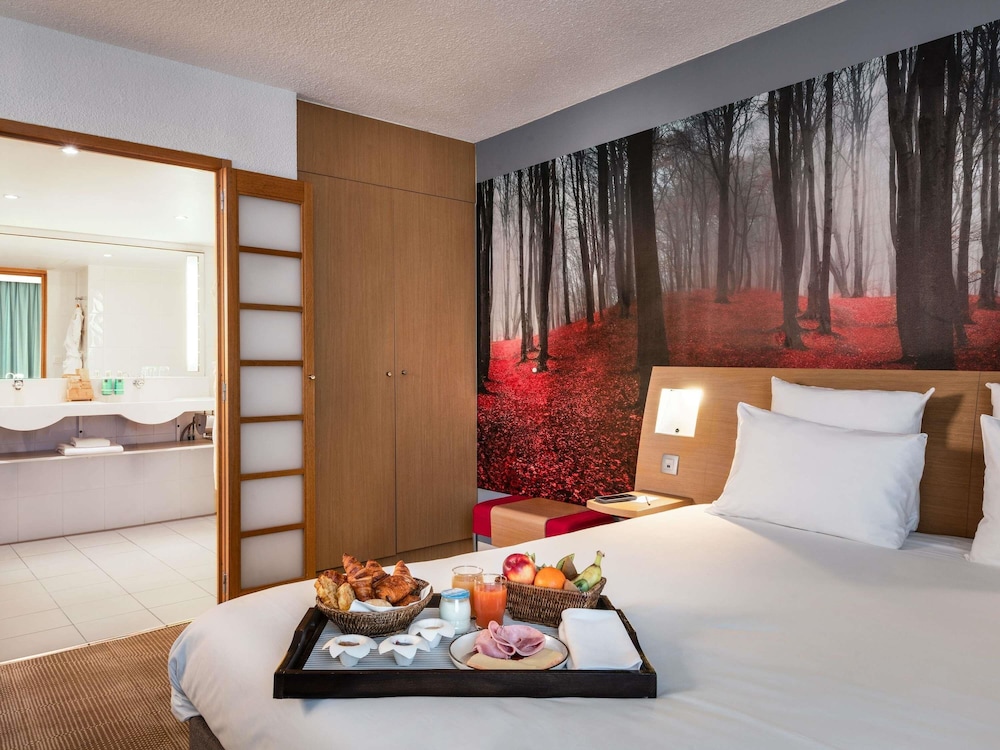Suite, 1 cama doble con sofá cama del hotel Novotel Paris Est. Foto 5
