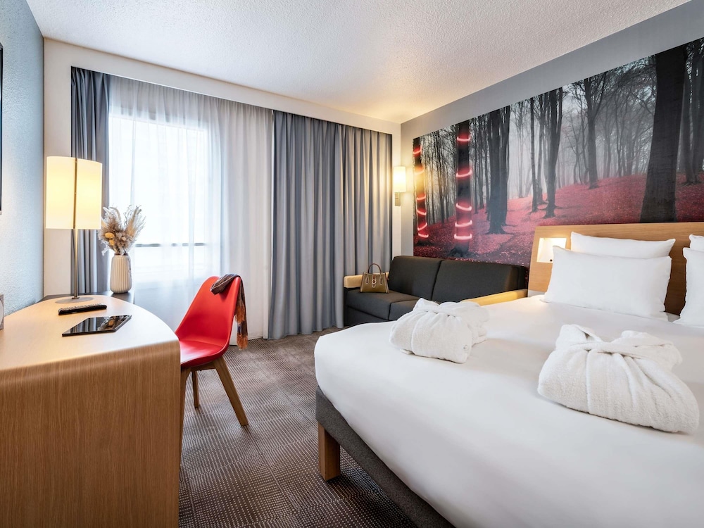 Habitación ejecutiva, 1 cama doble con sofá cama del hotel Novotel Paris Est. Foto 3