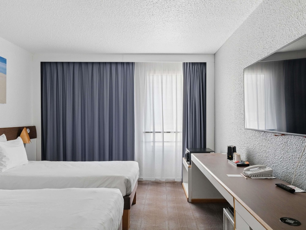 Habitación clásica, 2 camas individuales del hotel Novotel Paris Est. Foto 1