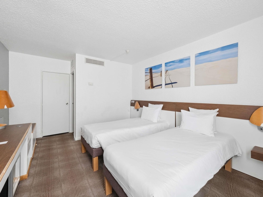 Habitación clásica, 2 camas individuales del hotel Novotel Paris Est. Foto 4