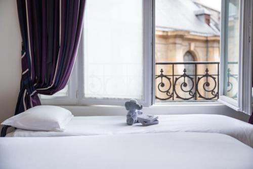 Habitación Triple Deluxe del hotel Pont Royal