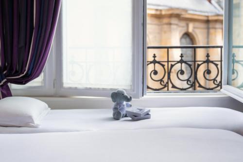 Habitación Triple Deluxe del hotel Pont Royal. Foto 1