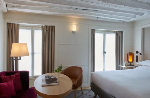 Habitación Superior - 1 cama grande del hotel Opéra Richepanse. Foto 3