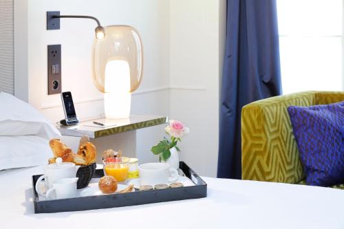 Habitación Clásica del hotel Opéra Richepanse. Foto 1