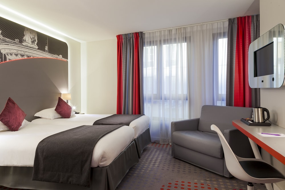 Habitación estándar con 2 camas individuales del hotel Inn Design Paris Place D'italie. Foto 4