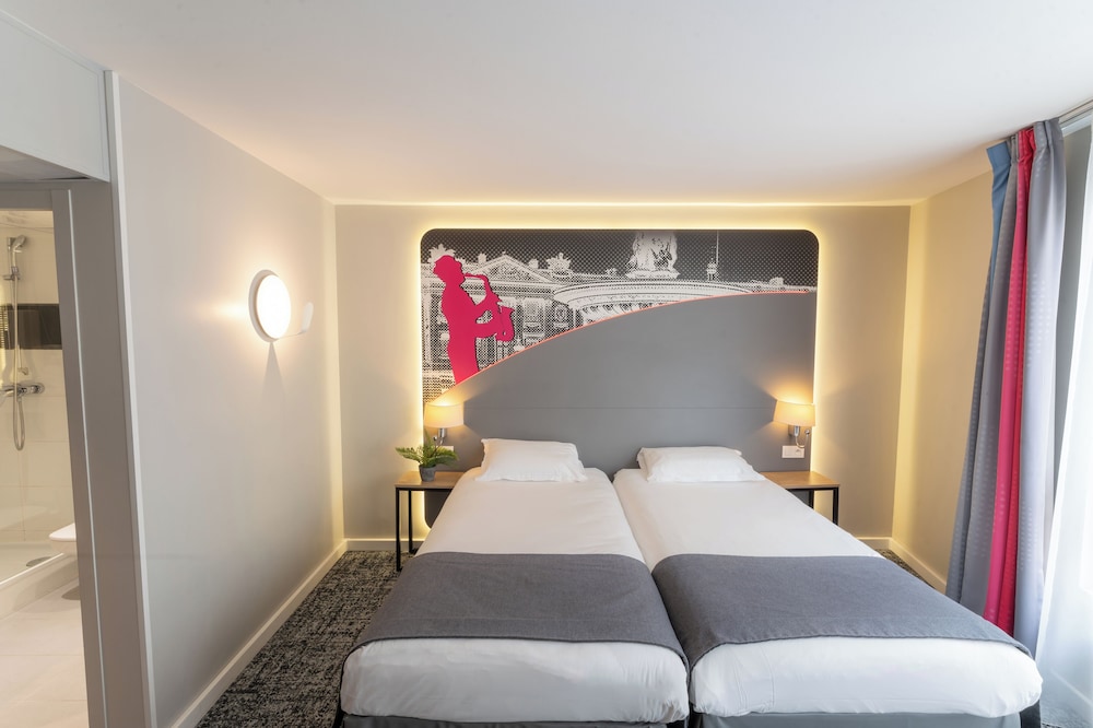 Habitación estándar con 2 camas individuales del hotel Inn Design Paris Place D'italie. Foto 8