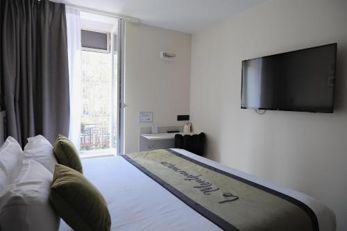 Habitación Doble Clásica del hotel Best Western Le Montparnasse. Foto 2