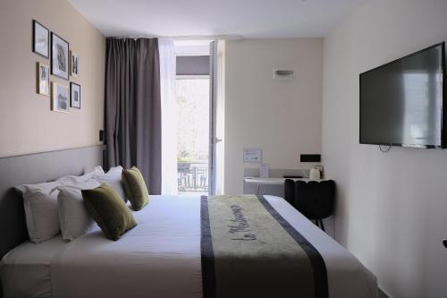 Habitación Doble Clásica del hotel Best Western Le Montparnasse. Foto 6