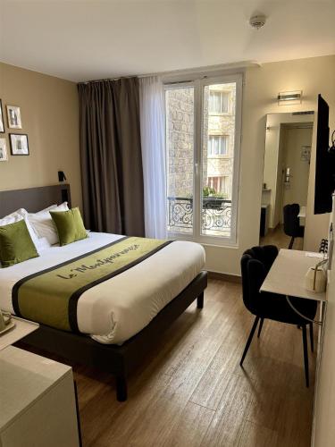 Habitación Doble Clásica del hotel Best Western Le Montparnasse. Foto 7