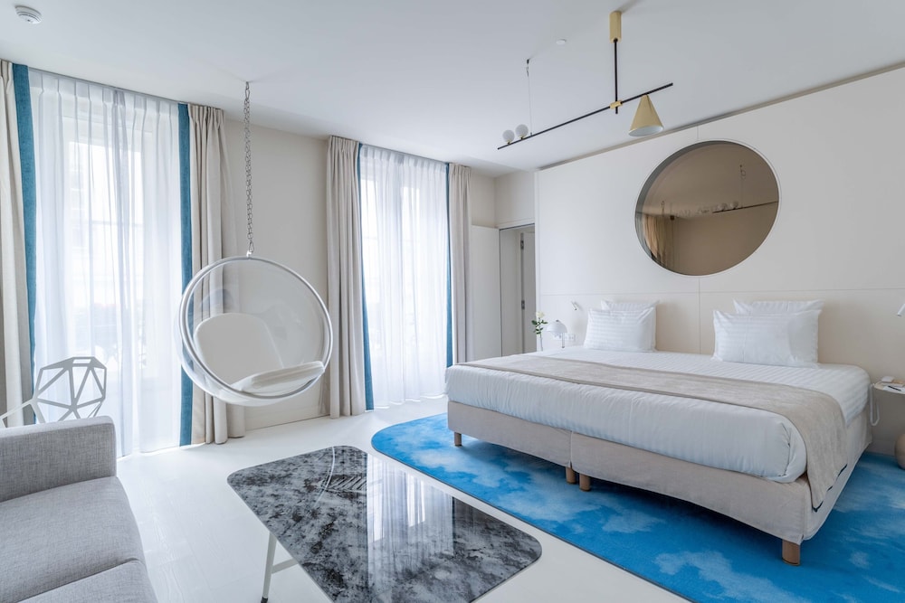 Habitación Superior Comunicante, 2 dormitorios, minibar soft de cortesía, bandeja de cortesía, Chromecast, prensa digital del hotel Astra Opéra - Astotel
