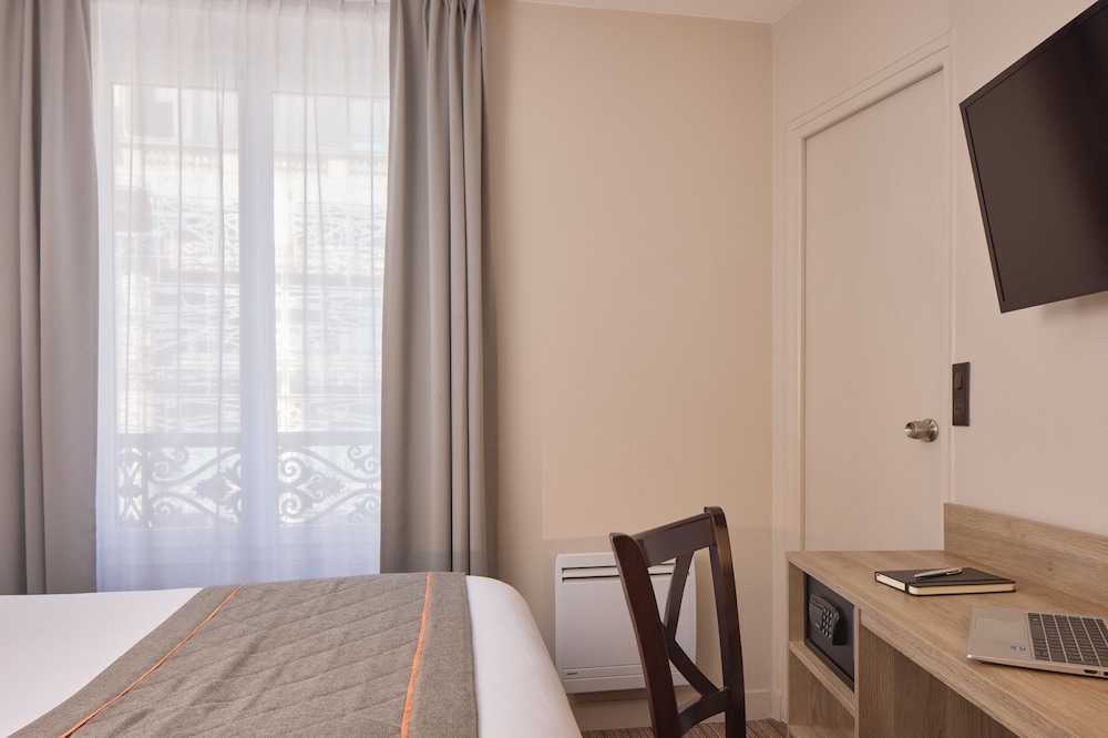 Habitación Confort Individual Superior del hotel Timhotel Le Louvre. Foto 4
