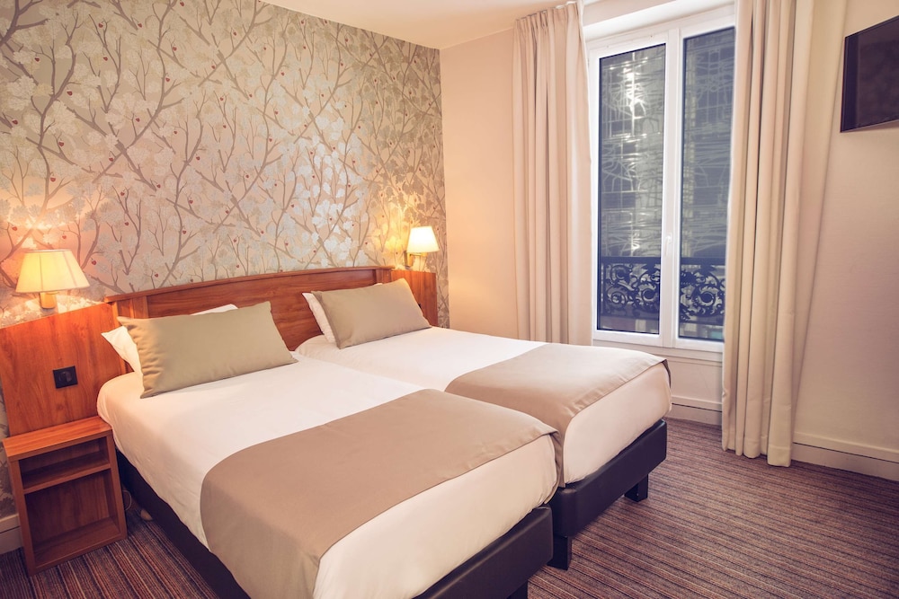 Habitación Confort Twin del hotel Timhotel Le Louvre. Foto 3