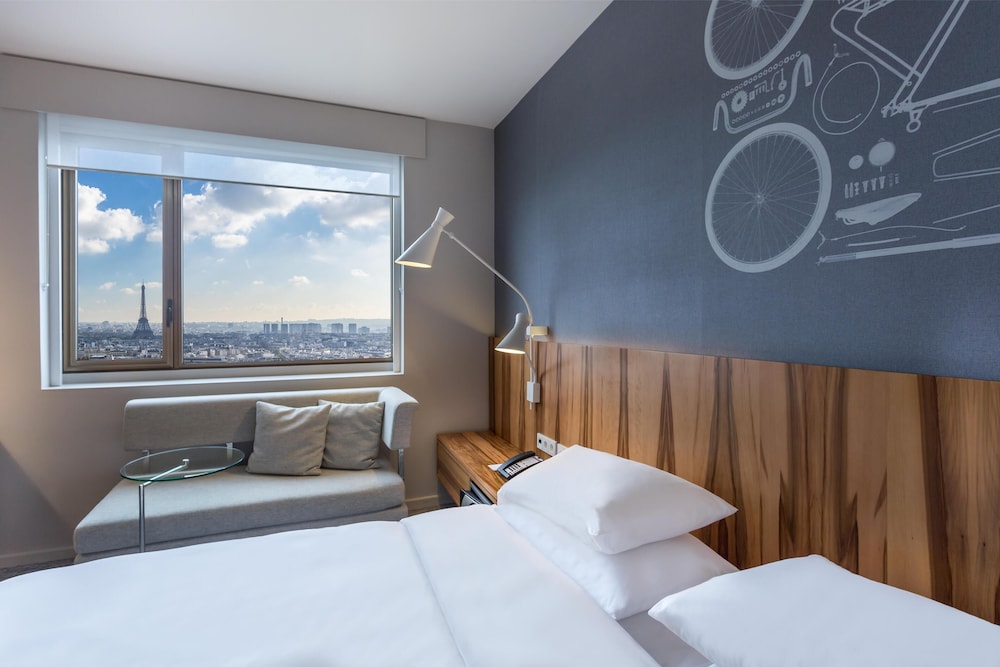 Habitación, 1 cama de matrimonio grande (Eiffel Tower View, Deluxe) del hotel Hyatt Regency Paris Etoile. Foto 3
