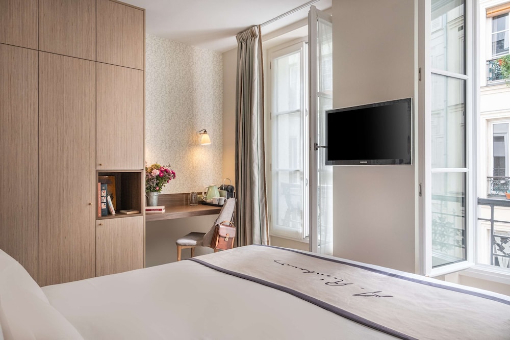 Habitación Deluxe, 1 cama de matrimonio grande, no fumadores, bañera del hotel Hotel Litteraire Arthur Rimbaud, BW Signature Collection. Foto 4