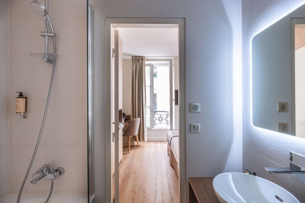 Habitación Deluxe, 1 cama de matrimonio grande, no fumadores, bañera del hotel Hotel Litteraire Arthur Rimbaud, BW Signature Collection. Foto 5