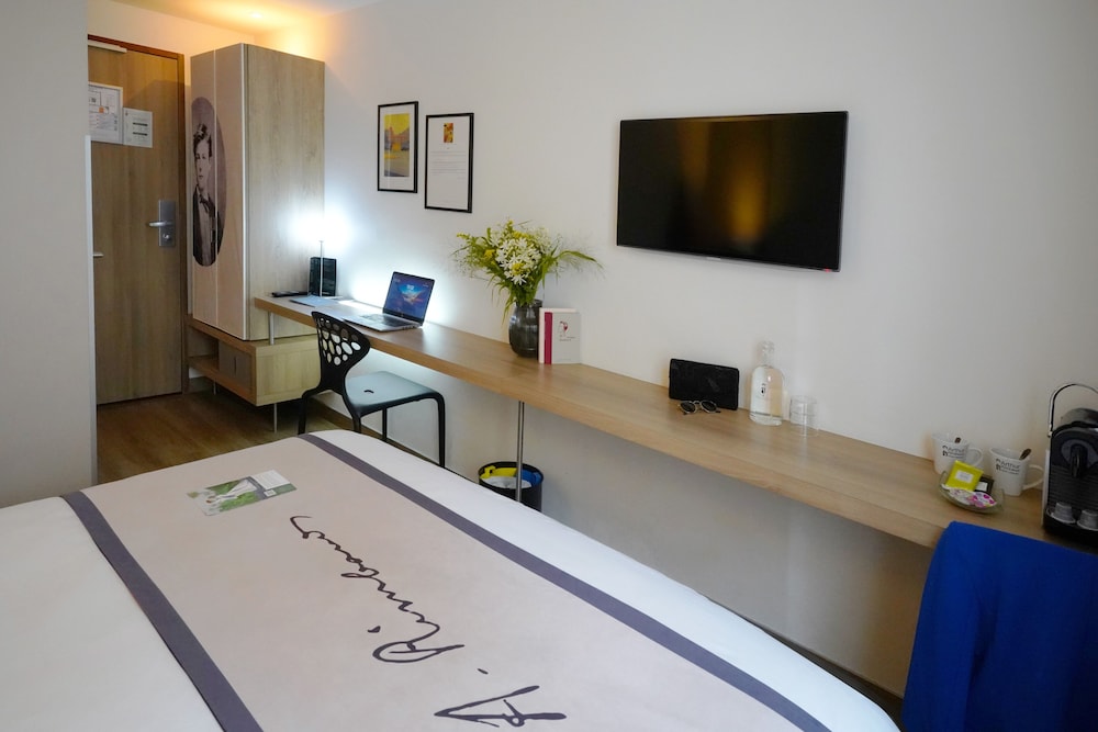 Habitación clásica, 1 cama de matrimonio, no fumadores del hotel Hotel Litteraire Arthur Rimbaud, BW Signature Collection. Foto 6