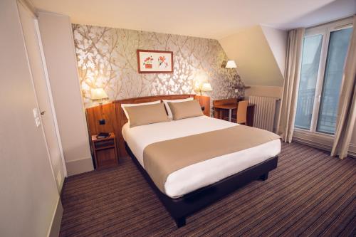 Habitación Doble Confort del hotel Timhotel Palais Royal. Foto 4