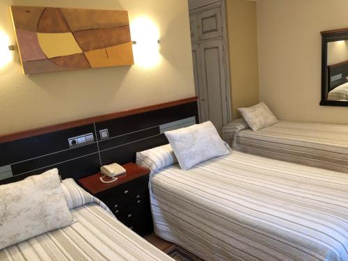 Habitación Triple del hotel Sena. Foto 1
