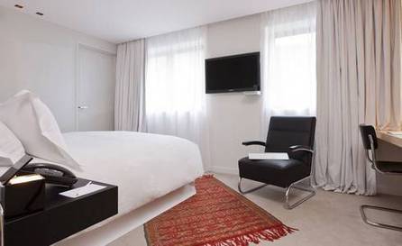 Habitación Doble Deluxe Couture del hotel La Maison Champs Elysées. Foto 4