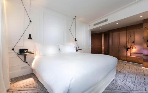 Suite Junior Couture del hotel La Maison Champs Elysées. Foto 6