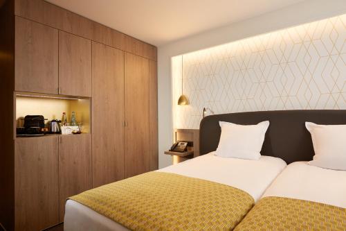 Habitación Deluxe del hotel Auteuil Tour Eiffel. Foto 4