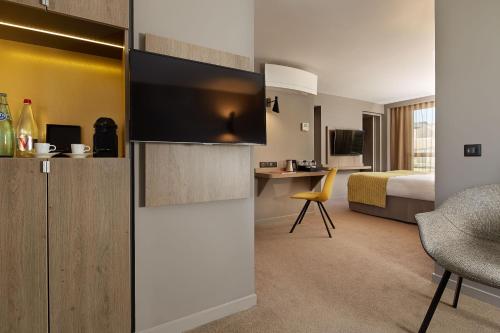 Suite Junior del hotel Auteuil Tour Eiffel. Foto 1