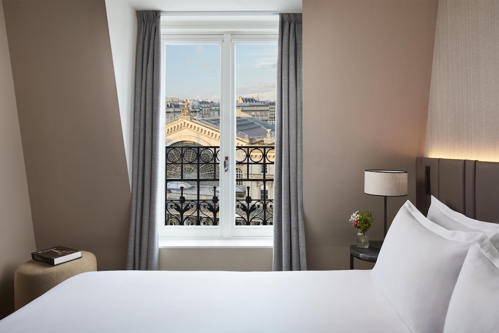 Suite Vista ciudad 1 Cama doble Normal del hotel NH Paris Gare de l'Est. Foto 1