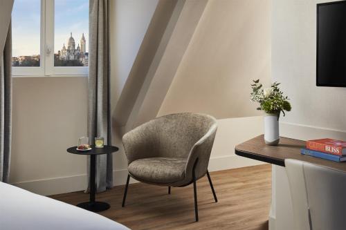 Habitación Doble Superior con Vistas del hotel NH Paris Gare de l'Est. Foto 3