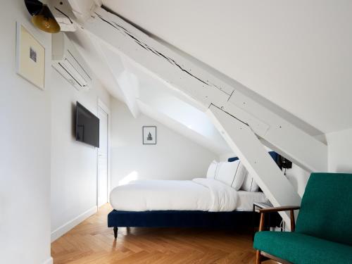 Habitación Doble - 1 o 2 camas - Under the Eaves del hotel Rendez-vous Batignolles. Foto 1
