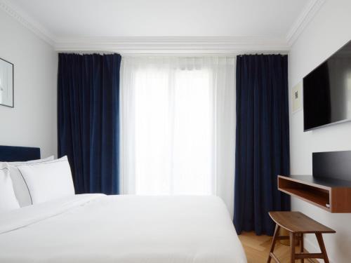 Habitación Doble Confort del hotel Rendez-vous Batignolles. Foto 6