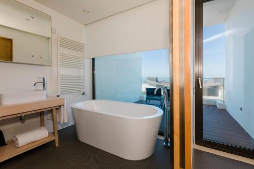 Habitación Doble Deluxe con vistas al mar - 1 o 2 camas del hotel Royal Obidos Spa and Golf Resort. Foto 2