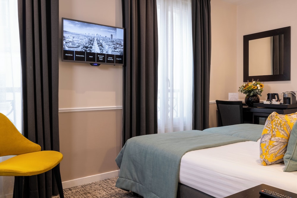 Habitación clásica con 2 camas individuales del hotel Park Lane Paris. Foto 4