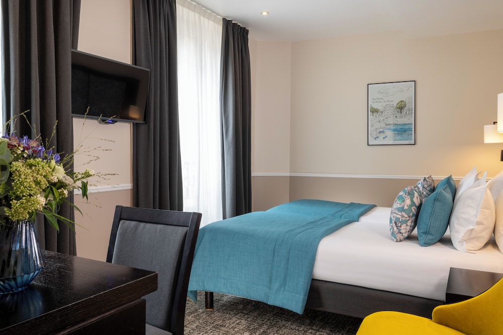 Habitación superior con 2 camas individuales del hotel Park Lane Paris