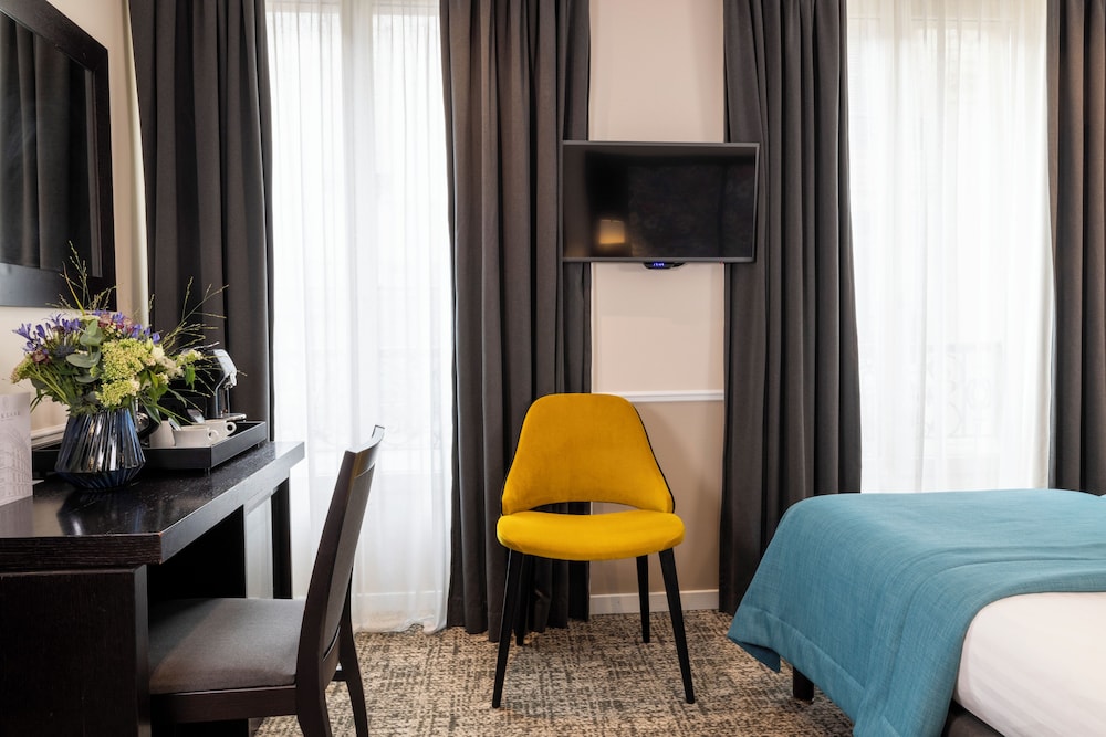 Habitación superior con 2 camas individuales del hotel Park Lane Paris. Foto 3